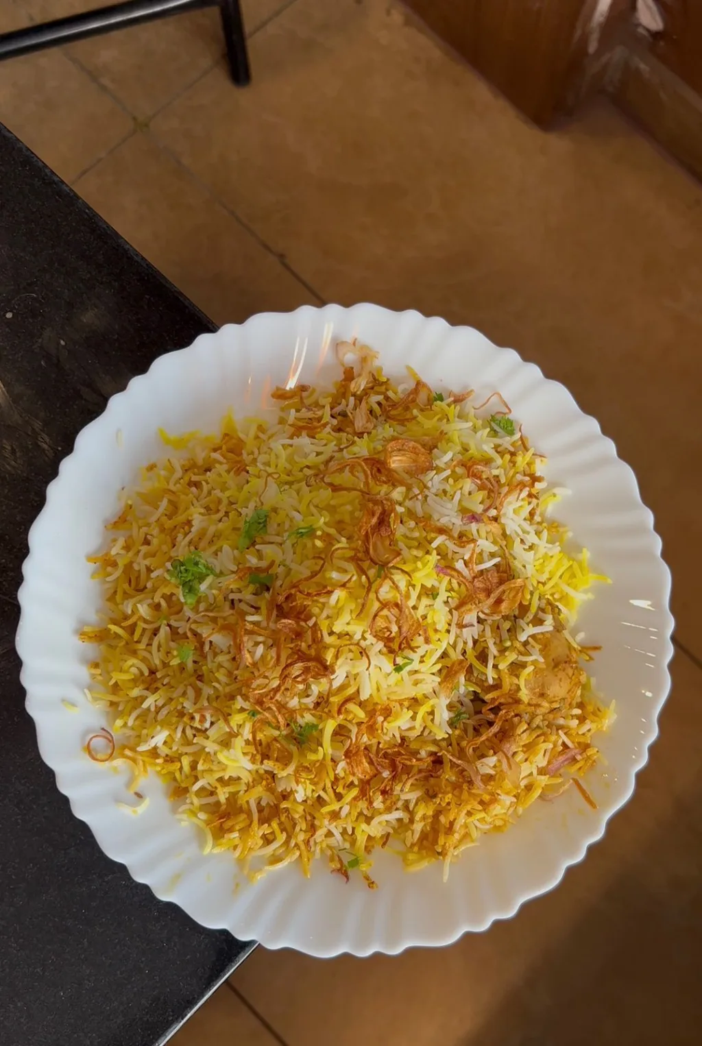 Signature biryani, Zafrani Darbar, phone shot before Pleny